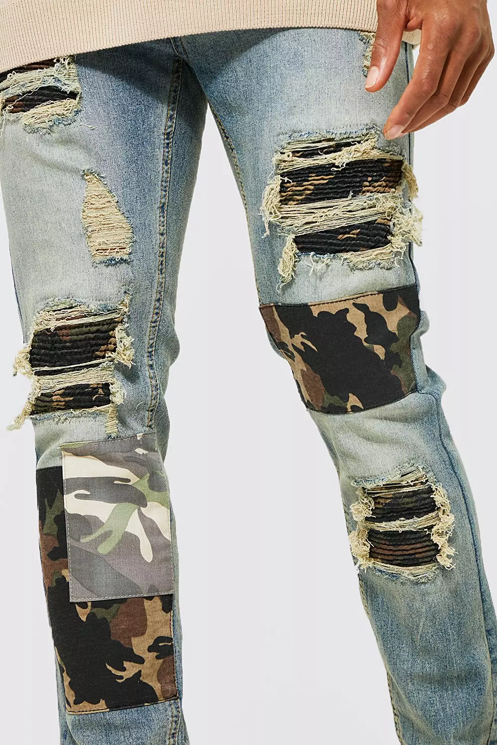 Ripped jeans store with camo patches